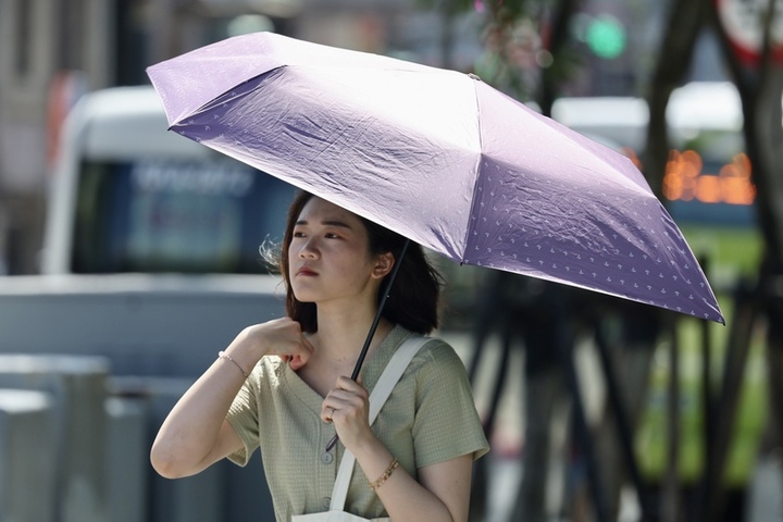 今天仍是高溫炎熱的天氣型態。圖/取自中央社