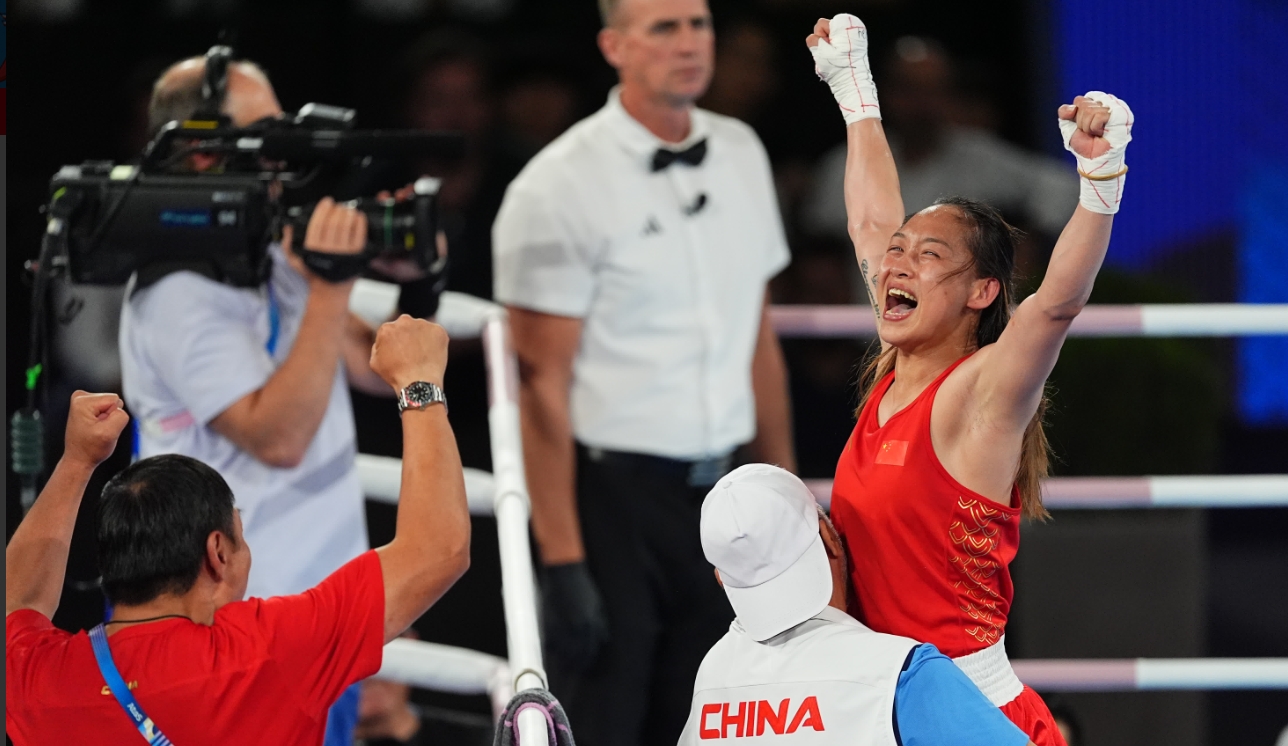 中國大陸選手常園慶祝勝利。圖/取中自新社