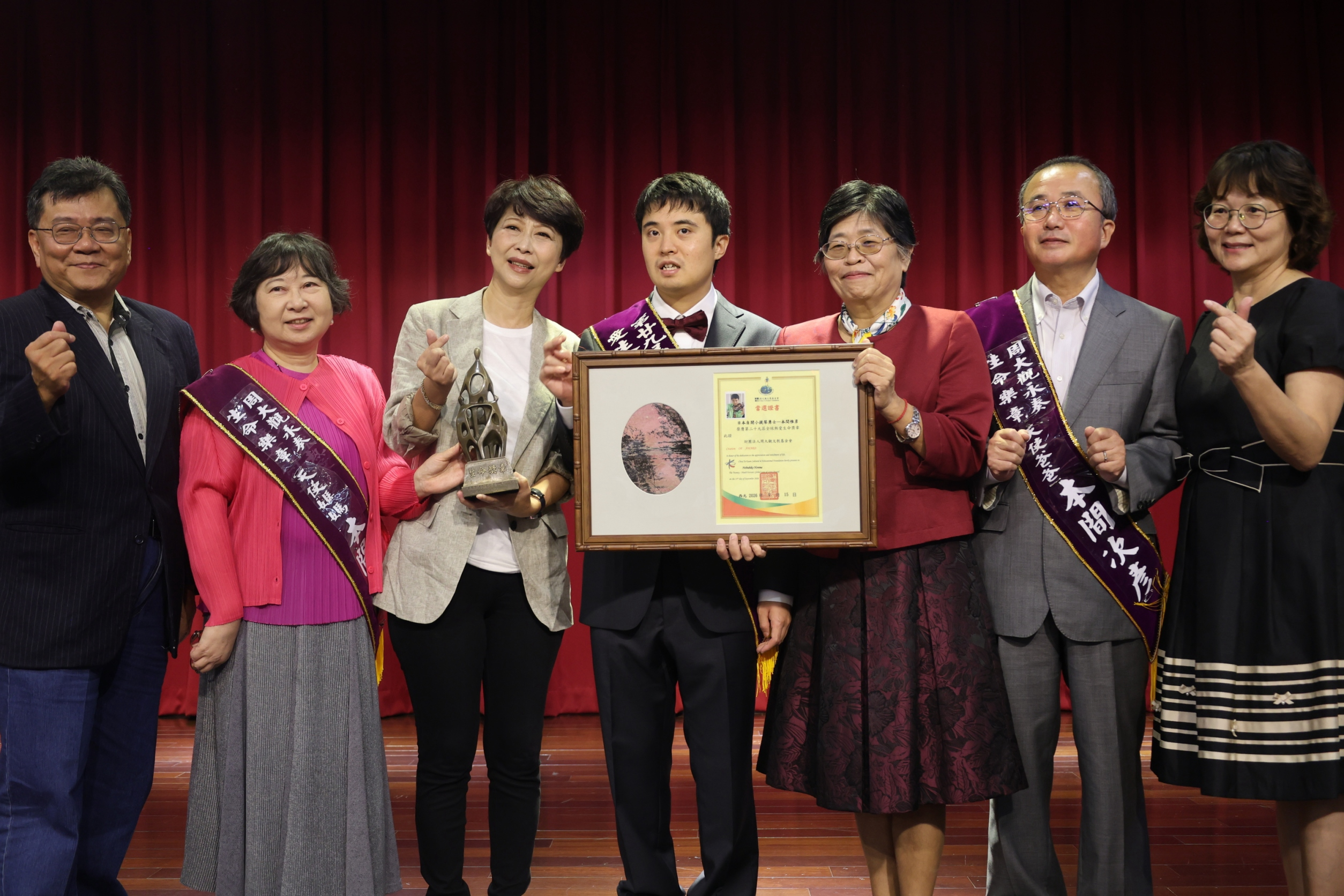 全球熱愛生命獎章得主會師台南德光中學　日自閉勇士本間惟彦琴音傳愛 