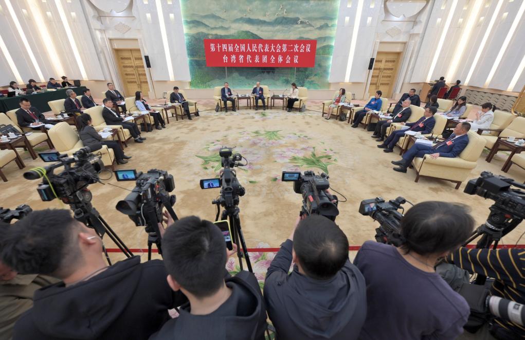 9日，大陸全國人大台灣省代表團舉行開放團組全體會議，吸引91家中外媒體的128名記者到場。圖/取自新華社