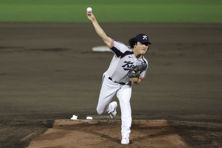 名古屋亞運中華棒球代表隊21日預賽首戰與韓國交手,韓國派出王牌投手郭彬(圖)擔任先發。圖/中央社