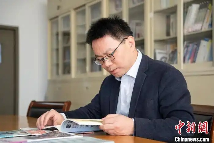  針對今年北京「兩會」政府工作報告涉台部分，清華大學台研究副院長鄭振清認為，是對涉台公共政策塑造統一大勢，是二戰後唯一分裂國家如此處理的，一旦台海有事，也能有所保障。圖／取自中新網