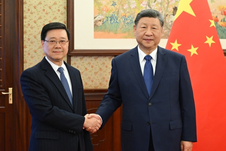 習近平以「勇於擔當、積極進取」對李家超、港府表示「充分肯定」。圖/中央社